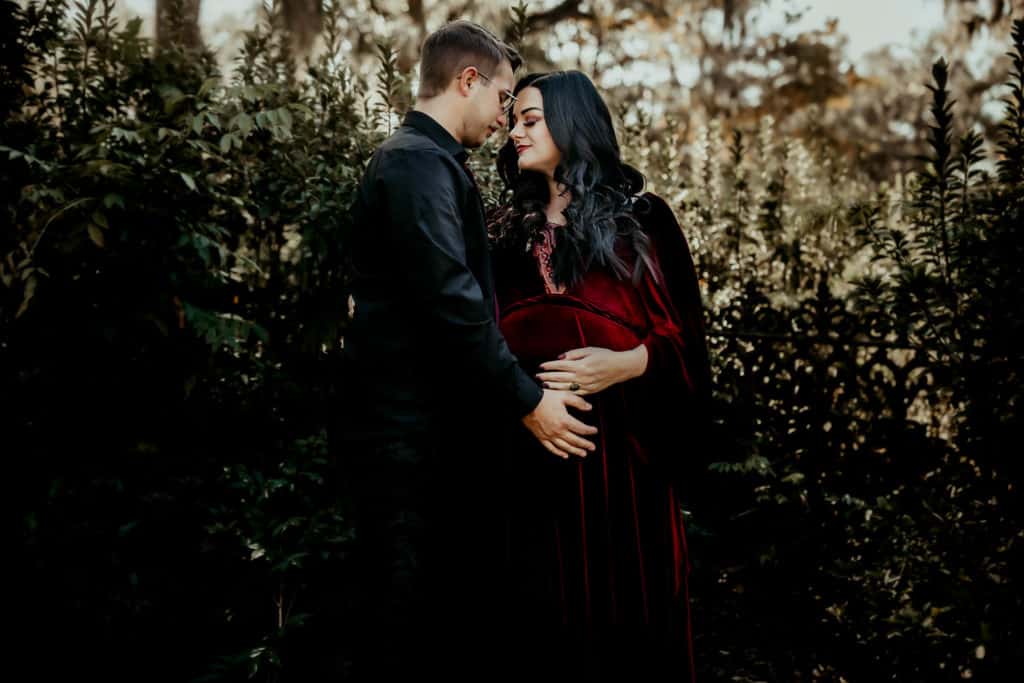 Couples maternity photo session capture at cemetery