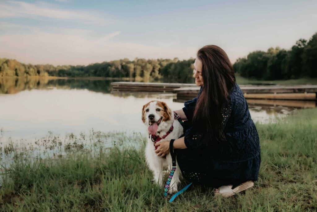 Everything You Need to Know Before Booking a Perry Photographer 2 Family with dog at Flat Creek in Perry GA