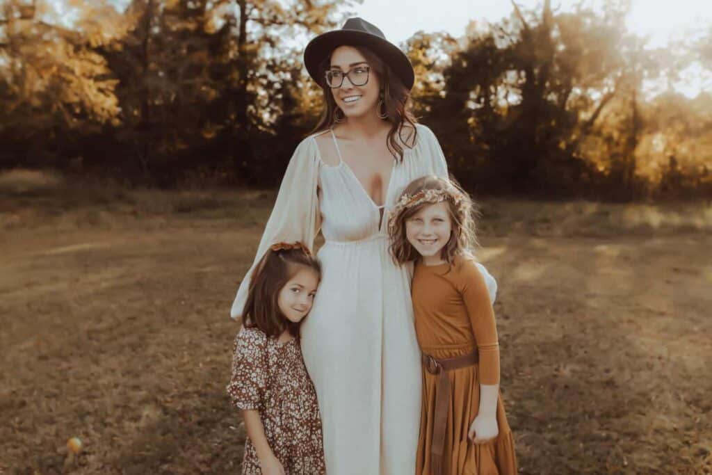Mom with her two daughters during outdoor fall family photos in Macon GA