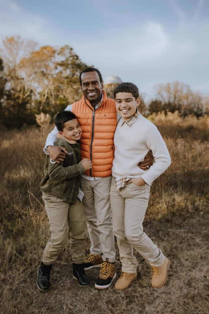 How to Choose a Family Photographer in Macon, GA 12 Father with his two sons during an outdoor family photo session in Middle Georgia