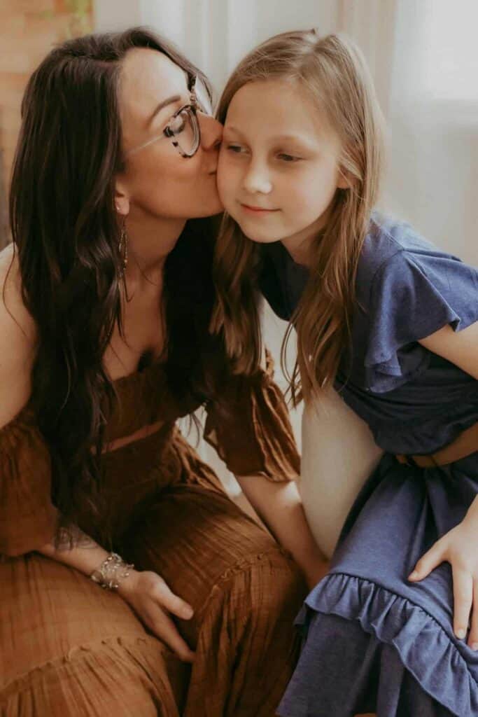 Warner Robins Pediatricians: A Local Guide for Families 8 Mother spending time at home with her daughter and young son during a relaxed family photography session